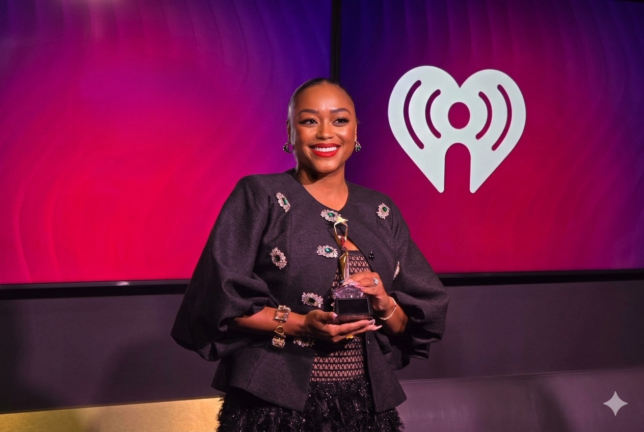 Attorney Aura Taylor holding an award
